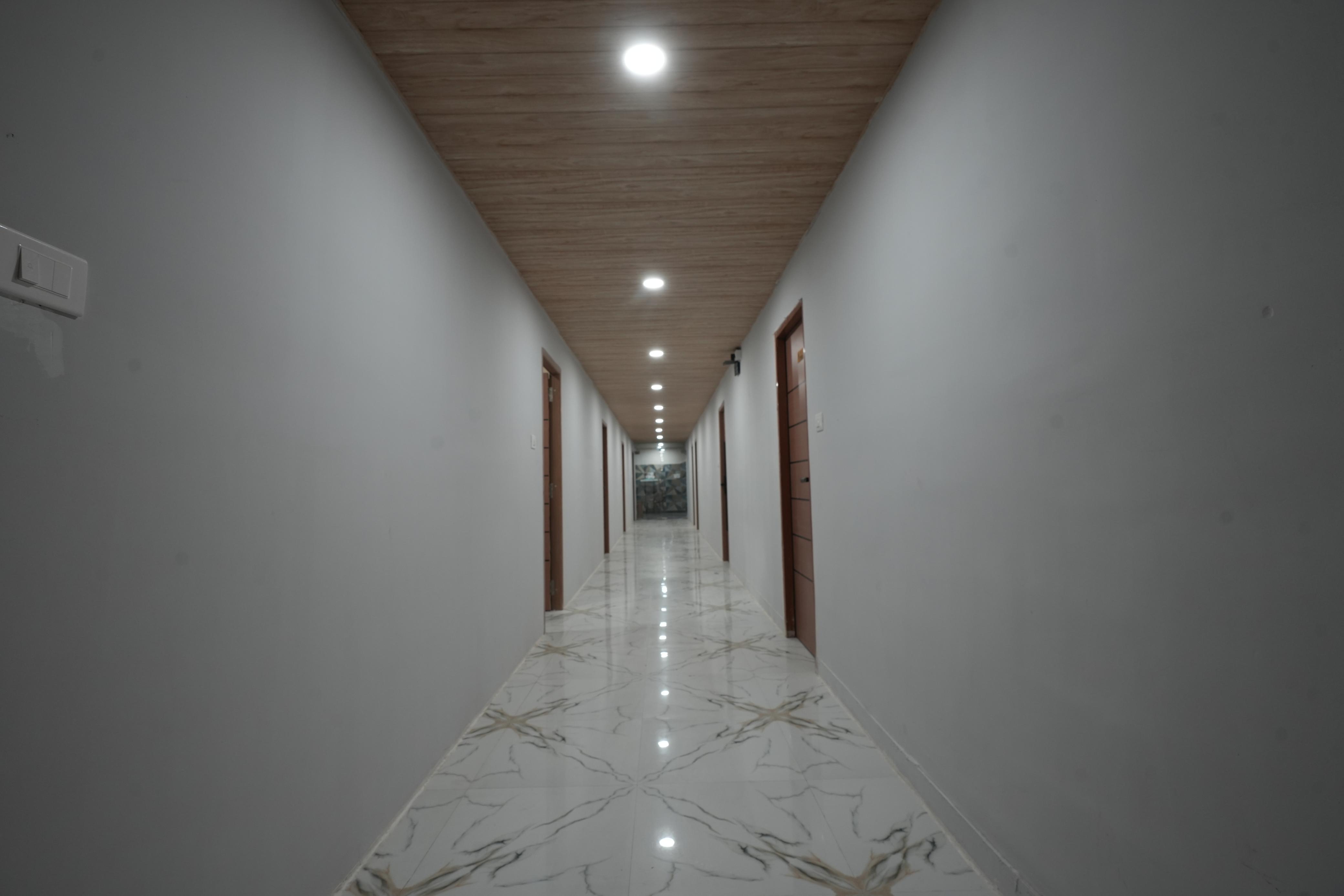 Corridor leading to guest rooms at Gachibowli