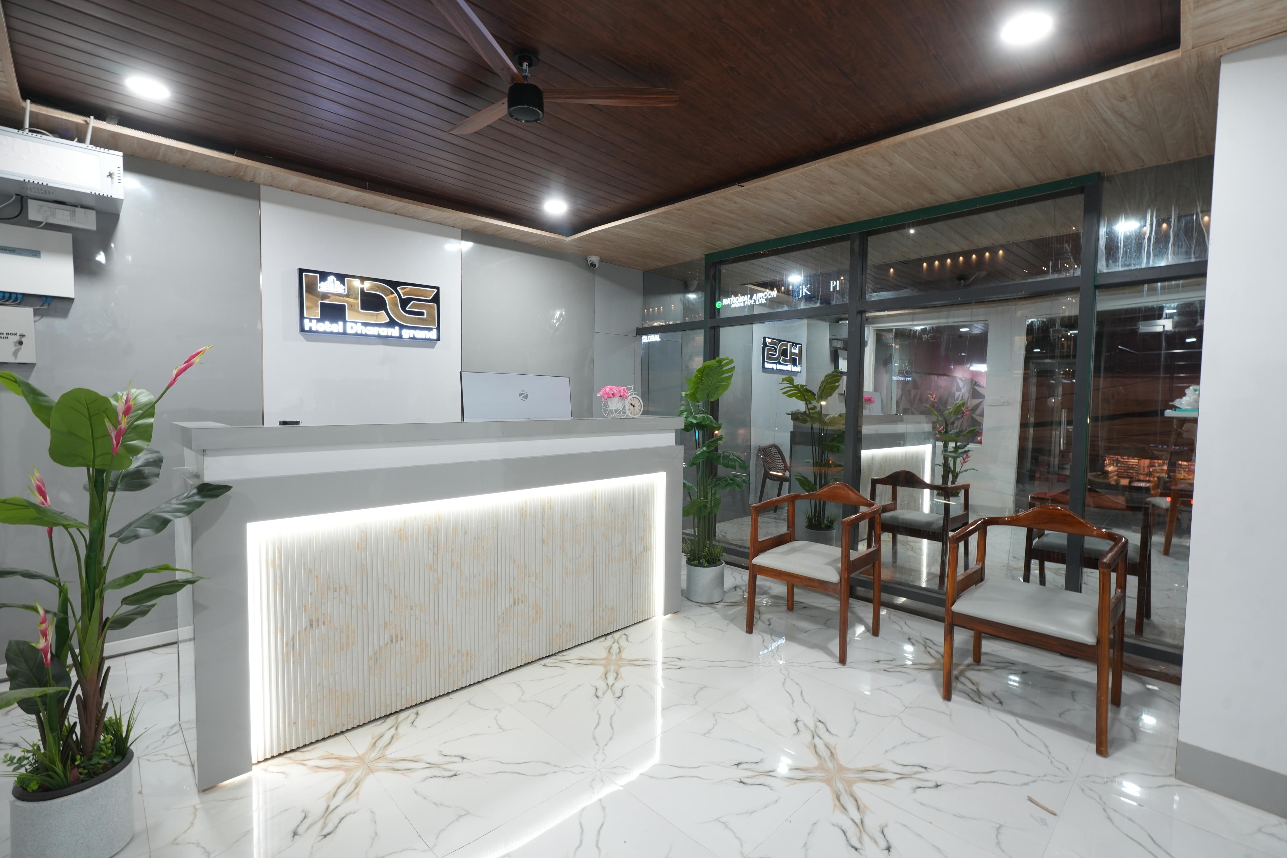Reception and waiting area at Hotel Dharani Grand Gachibowli