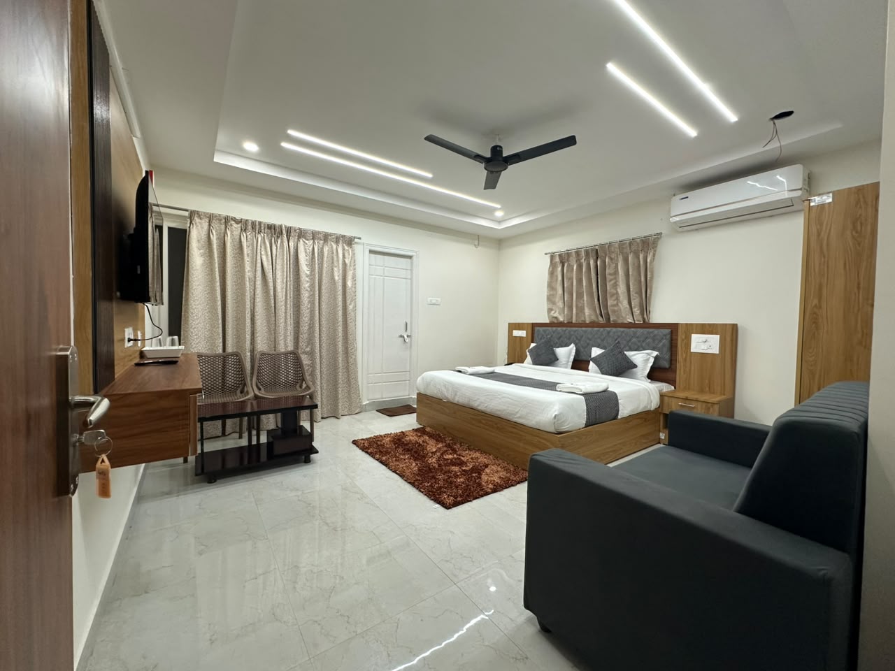Guest room interior at Hotel Dharani Grand KPHB